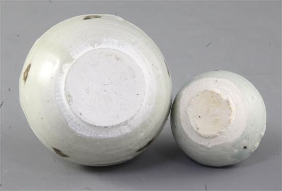 A Chinese Qiangbai iron spot covered jarlet and a smaller two handled jarlet, Yuan dynasty, 14th century, height 8cm and 4.2cm